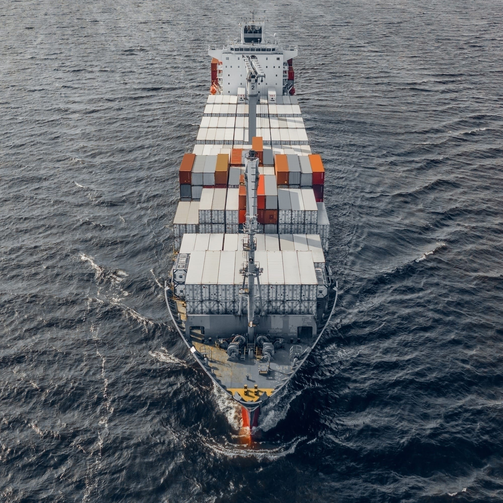 Container ship floating in sea